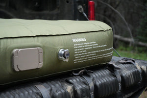 Self-inflating valve and battery module port detail on the Basecamp Mattress